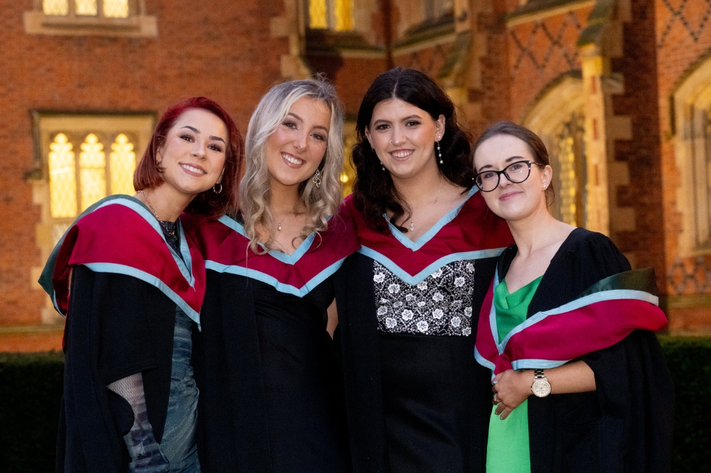 group of four female friends celebrate graduating at Winter Graduation 2023