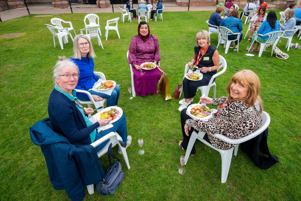 Staff carers enjoying a barbecue on Queen's quadrangle