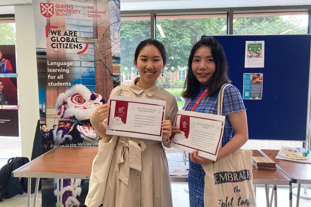 Students promoting the Dragon Boat Festival at the Language Centre / iRise Summer Social and Wellbeing event, Peter Froggatt Centre