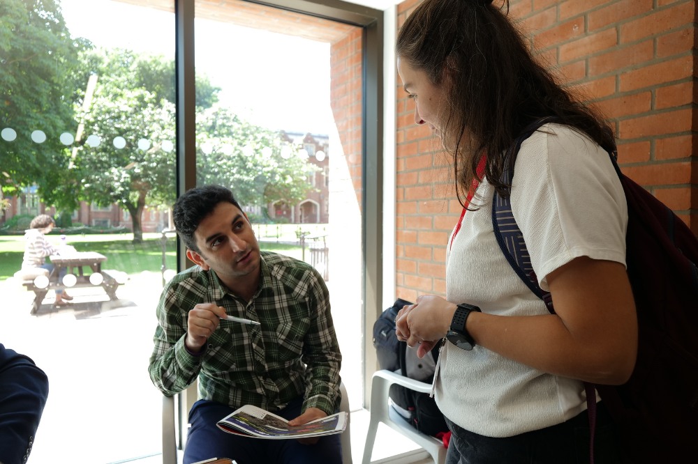 two students chatting at the Language Centre / iRise Summer Social and Wellbeing event, Peter Froggatt Centre