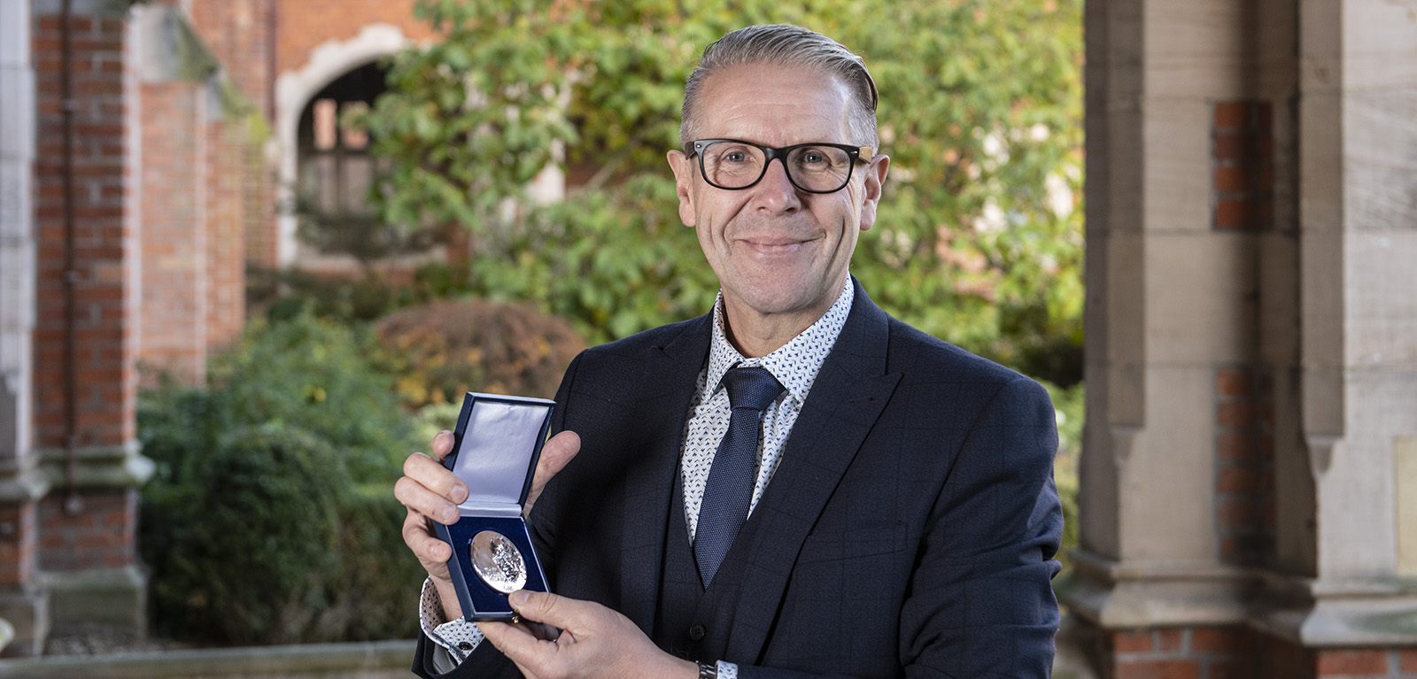 David Jones with Griffith medal and prize