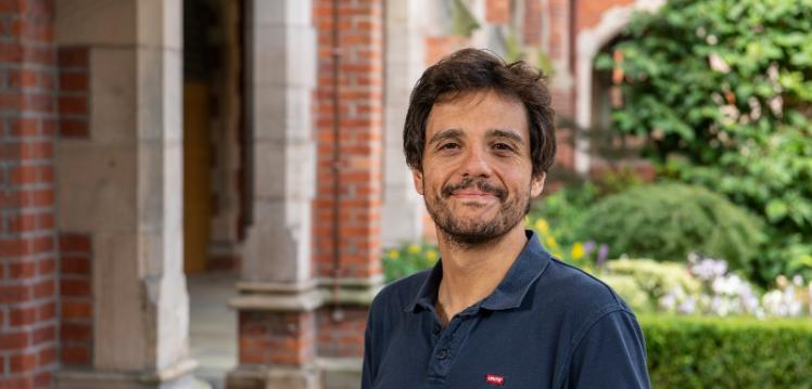 head and shoulders crop of Professor Mauro Paternostro in the cloisters in Queen's University Belfast, 2019