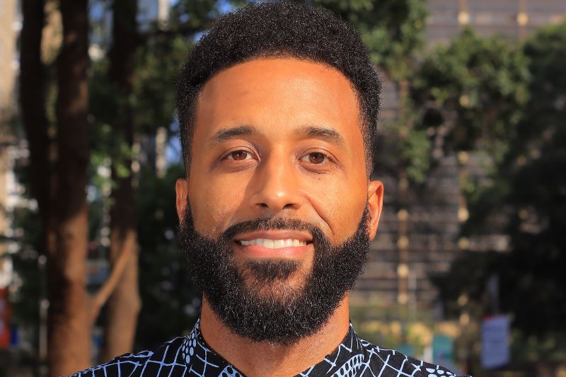 close-up headshot of Dr Brian Kwoba