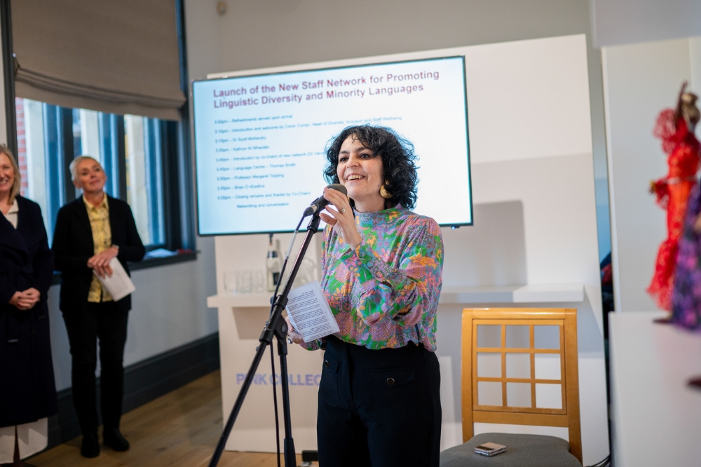 Dr Véronique Altglas, Co-Chair, speaking at the launch of Queen's new Staff Network for Promoting Linguistic Diversity and Minority Languages, in the Naughton Gallery