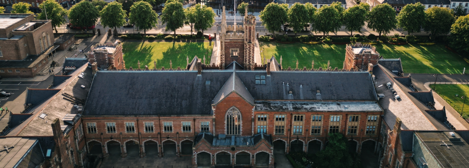 aerial view from the quadrangle of Queen's University Belfast towards the west, overlooking Queen's front lawns, One Elmwood and surrounding area
