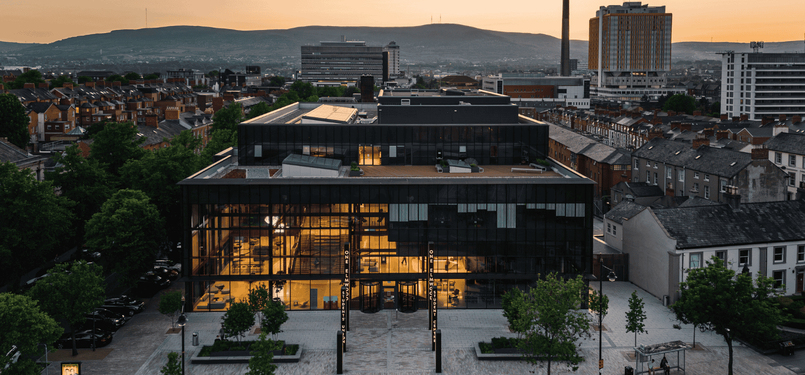aerial evening view from the front of the One Elmwood Building, Queen's University Belfast, looking west towards the Belfast Hills