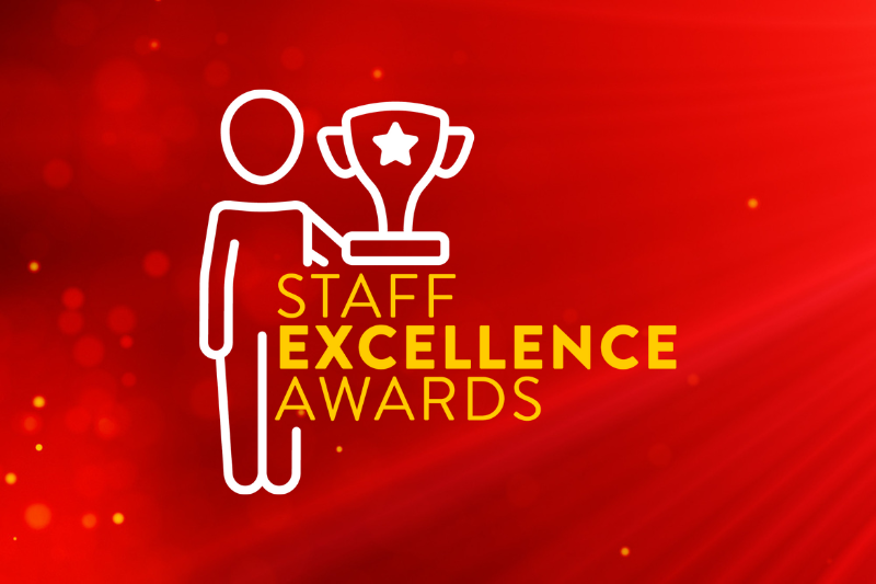 white icon on red background of person holding a trophy above the yellow words Staff Excellence Awards